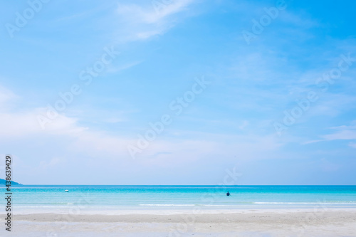 Sea and beautiful blue sky. Calm and relaxing empty beach scene. © Treechada