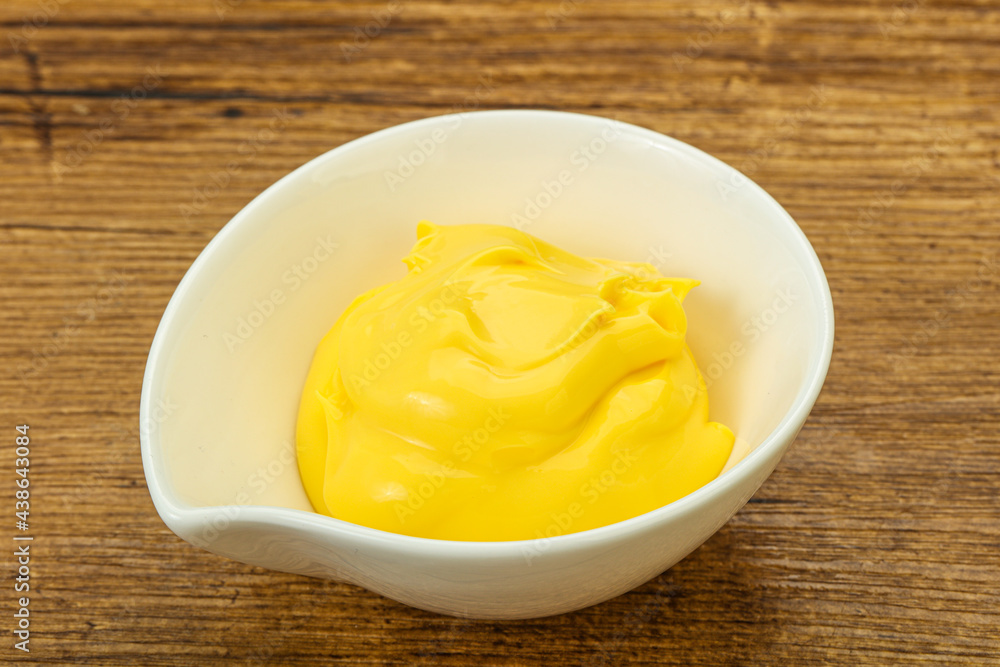 Natural cheese sauce in the bowl Natural cheese sauce in the bowl