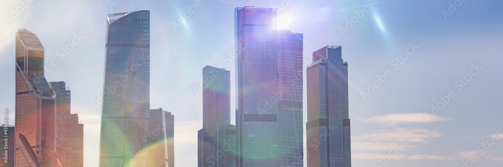 Silhouettes of urban skyscrapers against the sky. Business and economics background. Silhouettes of urban skyscrapers against the sky. Business and economics background.