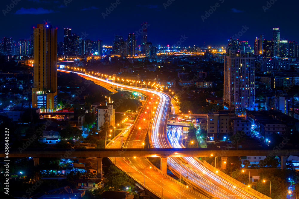 Bangkok cityscape night light. 
Lighting the night highway and tower building