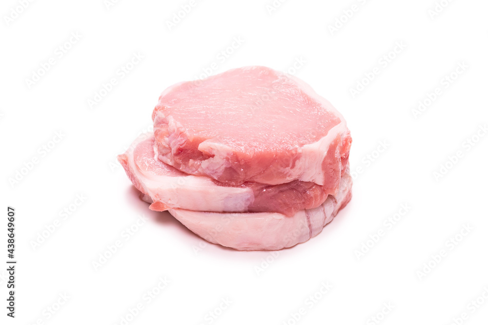 Raw pork pieces isolated on a white background. Raw pork pieces isolated on a white background.