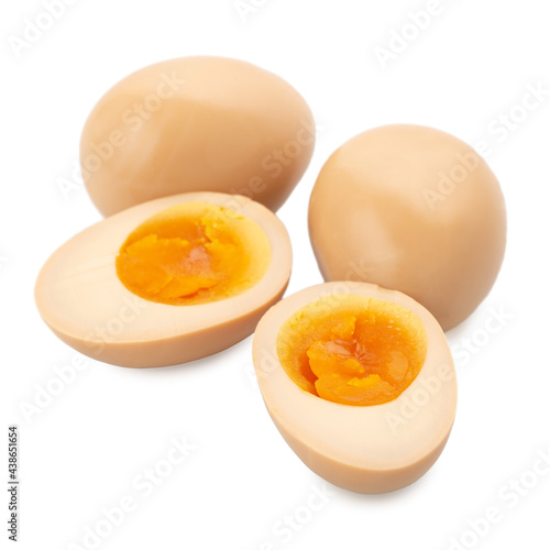 Nitamago Japanese marinated eggs in sauce soy for ramen is isolated on white background