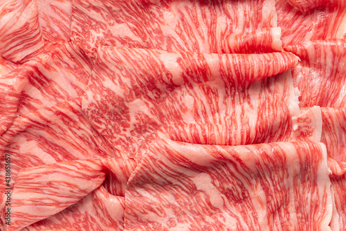 premium Japanese meat sliced wagyu marbled beef like background photo