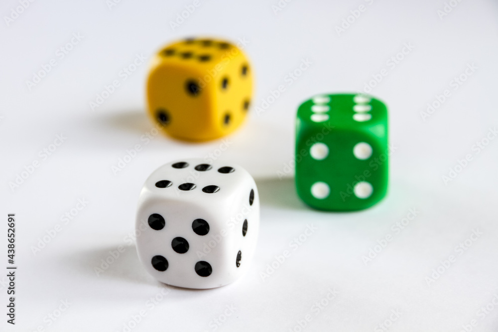 Three colorful dices isolated on white background Three colorful dices isolated on white background