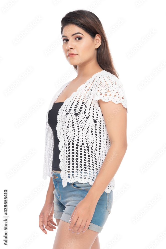 Lifestyle of a Indian woman, wearing hot pants and crochet jacket Lifestyle of a Indian woman, wearing hot pants and crochet jacket