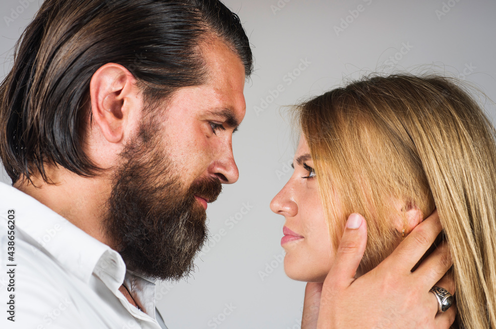 Romantic couple in love embracing. Sensual relationship. Closeup portrait. Romantic couple in love embracing. Sensual relationship. Closeup portrait.