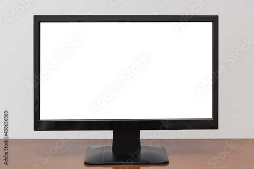 A television set with a blank screen on a furniture