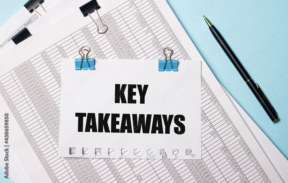 On a light blue background, documents, a pen and a sheet of paper on blue paper clips with the text KEY TAKEAWAYS. Business concept. On a light blue background, documents, a pen and a sheet of paper on blue paper clips with the text KEY TAKEAWAYS. Business concept.