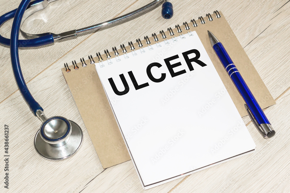 Medicine and health concept. stethoscope, WITH notebook on the table lies. ULGER Medicine and health concept. stethoscope, WITH notebook on the table lies. ULGER