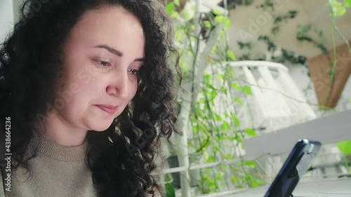 The woman cried when she saw the message on the phone