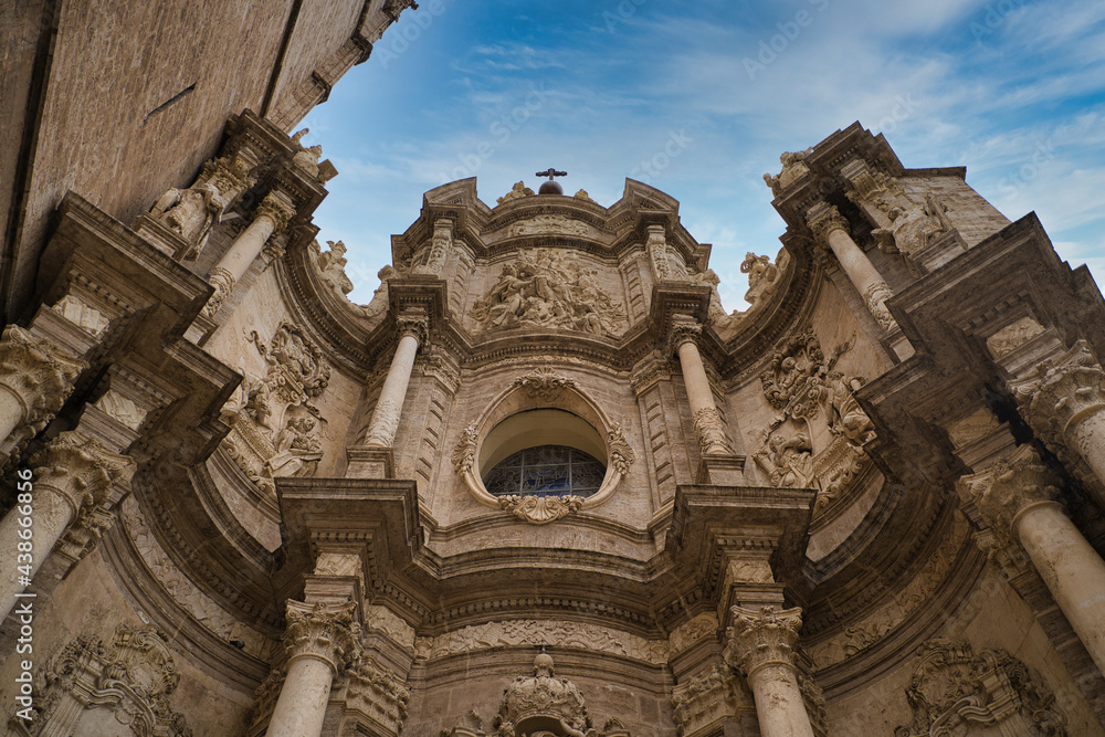 The facade of the Saint Mary Cathedral in Valencia, Spain. Baroque style architecture.