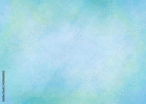 Watercolor background in soft blue and green painting with gradient painted texture lighter in the center, pastel blue green backgrounds or paper banner