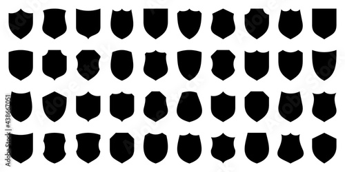 Set of various vintage shield icons. Black heraldic shields. Protection and security symbol, label. Vector illustration.
