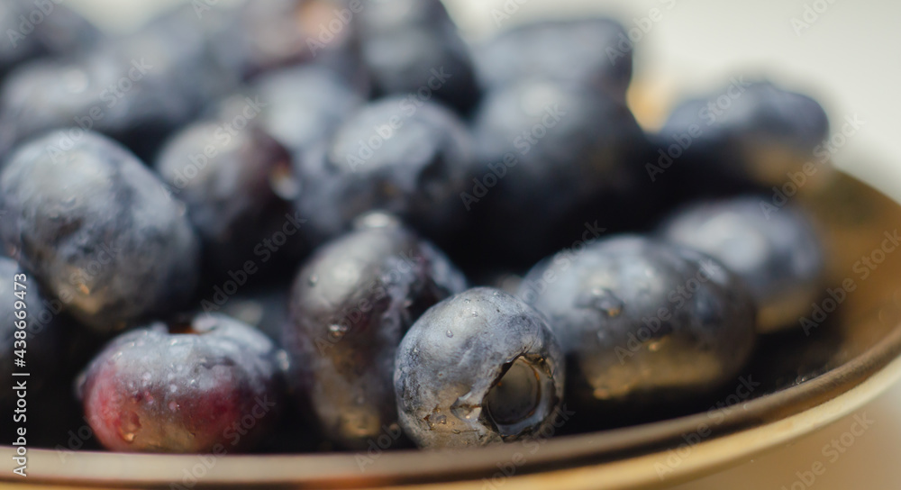Closeup on fresh and ripe blueberries on a white background Closeup on fresh and ripe blueberries on a white background