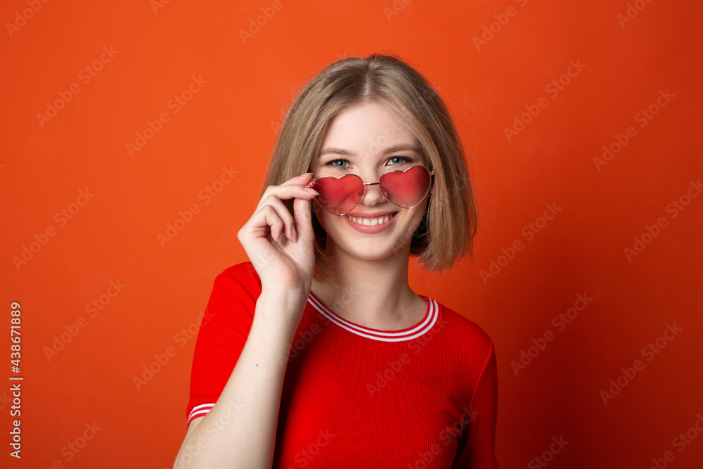 portrait of a beautiful young woman wearing sunglasses portrait of a beautiful young woman wearing sunglasses