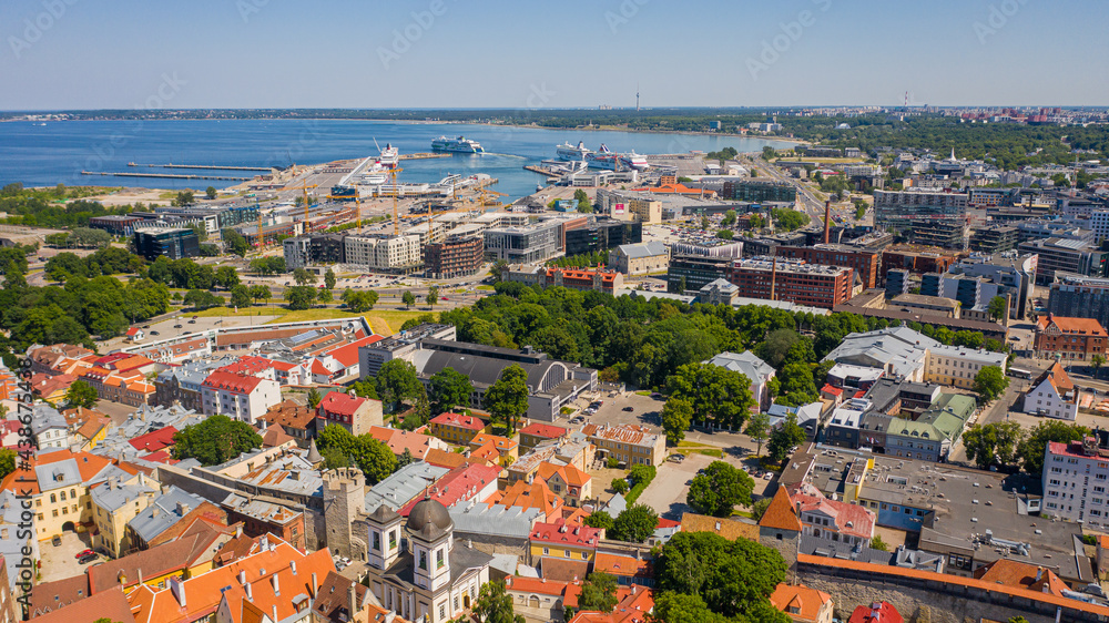 Tallinn ,Estonia,Baltics. Beautiful panoramic aerial view photo from flying drone to Tallinn's medieval old town on a sunny summer day. (Series)