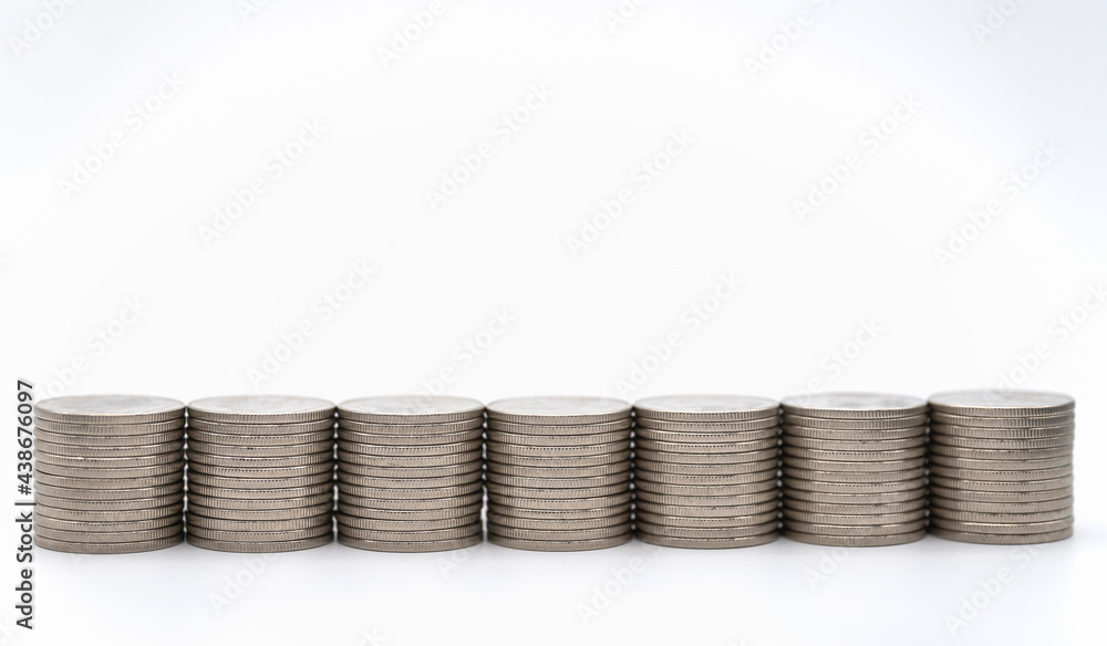 Money and Financial Concept. Closeup of stack of silver coins on white background. Money and Financial Concept. Closeup of stack of silver coins on white background.