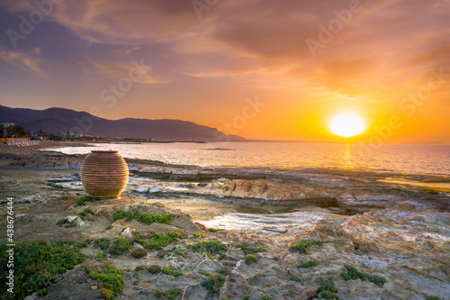 A big pot at sunset in Potamos beach at Malia, Crete, Greece.