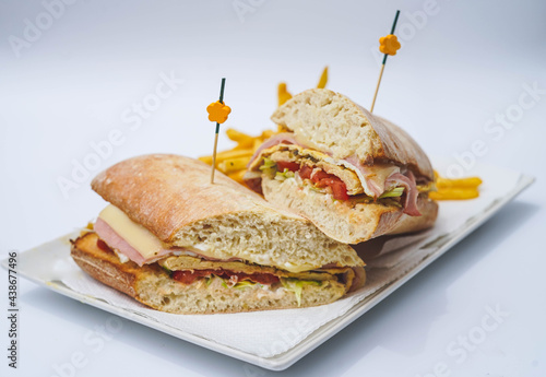 Sandwich de solomillo de ternera con jamon y queso photo