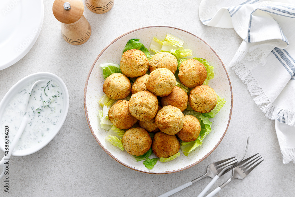 Falafel with greek yogurt sauce tzatziki, mediterranean cuisine Falafel with greek yogurt sauce tzatziki, mediterranean cuisine