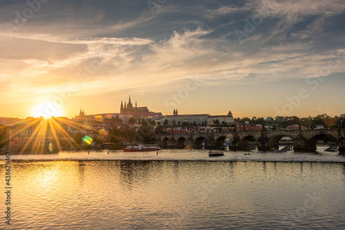 PRAGUE, CZECH REPUBLIC, 31 JULY 2020: Amazing sunset over the castle of Prague and the Vltava river