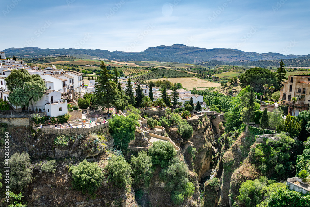a landscape view of the hills and valleys surrounding the magical mountain town of Ronda in southern Spain