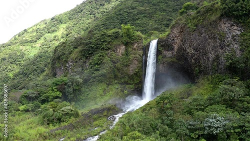 Still video and panning shot of a large waterfall near Banos, Ecuador in South America