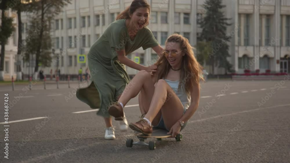 Again together. Multiracial Friends run on skate together after a long separation and happily laugh and enjoy life, drink coffee, sit with skateboards. ProRes Again together. Multiracial Friends run on skate together after a long separation and happily laugh and enjoy life, drink coffee, sit with skateboards. ProRes
