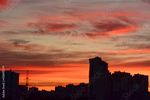 Pink sunset in the city. Urban landscape 