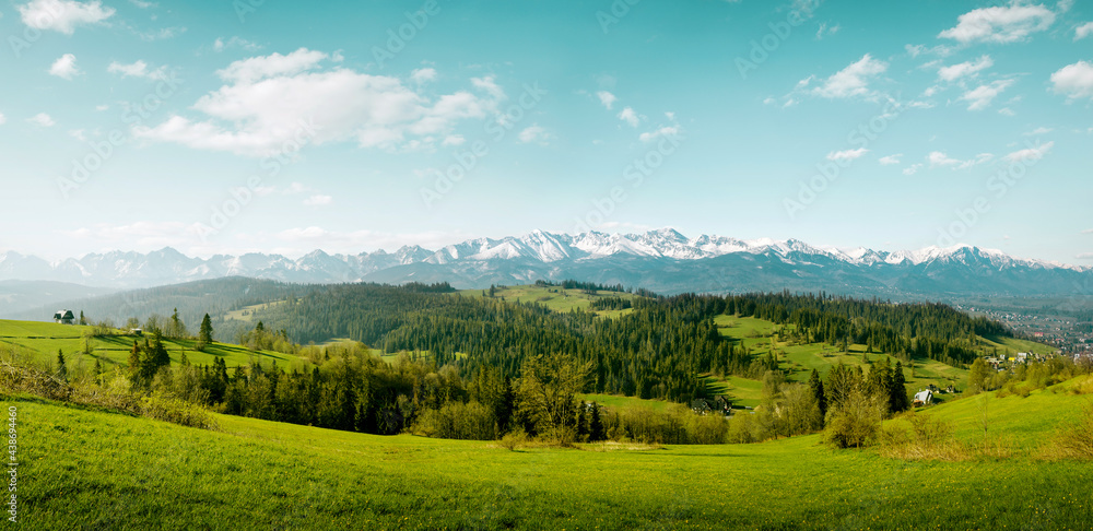 Panorama of snow-capped Tatry Mountains on Podhale in Poland