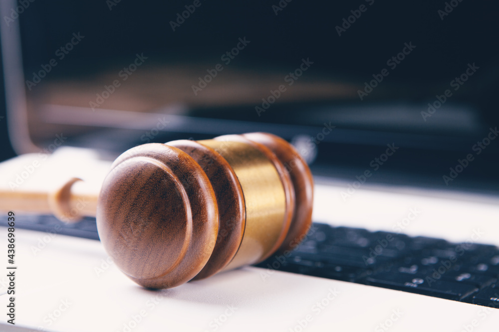 judge hammer on laptop