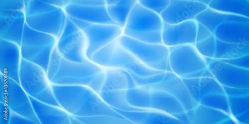 Water surface background with sunlight glares and caustic ripples. Top view. In light blue colors