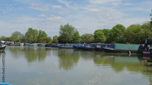 Narrowboats moored in an English marina