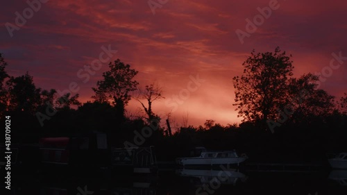 Sunset over narrowboats in England at the marina