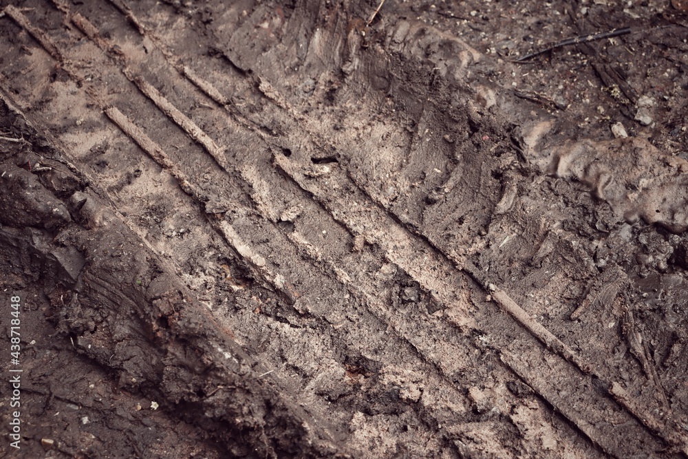 Wheel tracks on the soil road background or texture Wheel tracks on the soil road background or texture