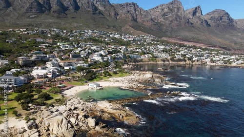 Aerial view of Camps Bay tidal pool summer Lions Head mountain, Cape Town, South Africa.