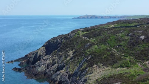 Peaceful Amlwch Anglesey North Wales rugged mountain coastal walk aerial view slow right dolly shot photo