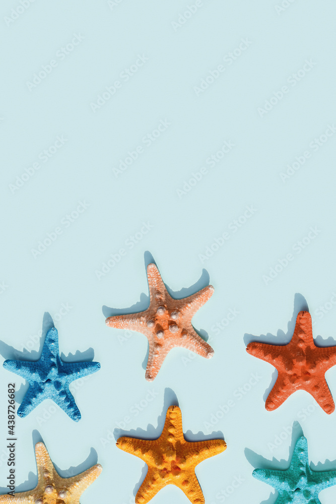 Nautic scene with colorful sea stars. Happy, bright and summer mood flat lay. Nautic scene with colorful sea stars. Happy, bright and summer mood flat lay.
