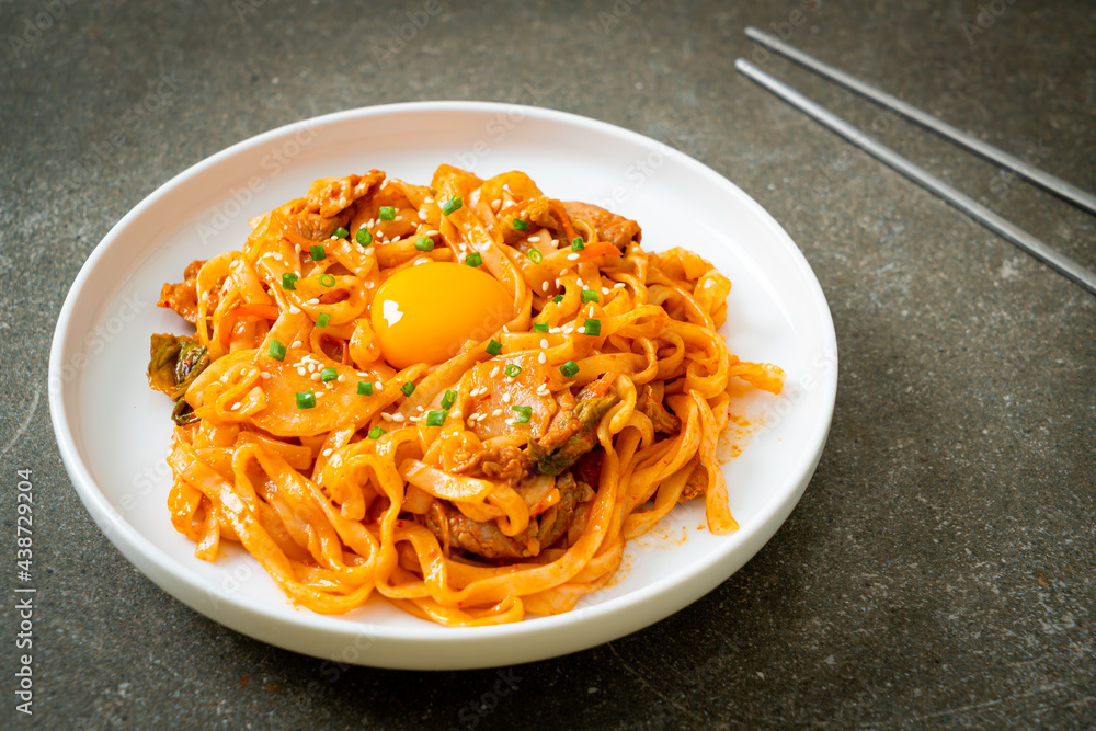 stir-fried udon noodles with kimchi and pork stir-fried udon noodles with kimchi and pork