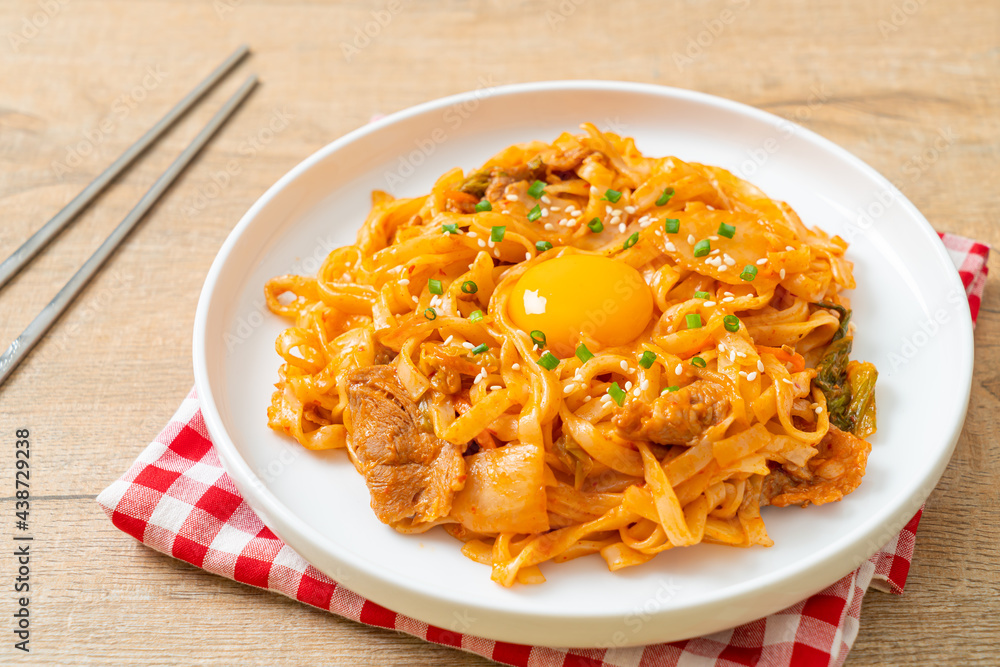 stir-fried udon noodles with kimchi and pork stir-fried udon noodles with kimchi and pork