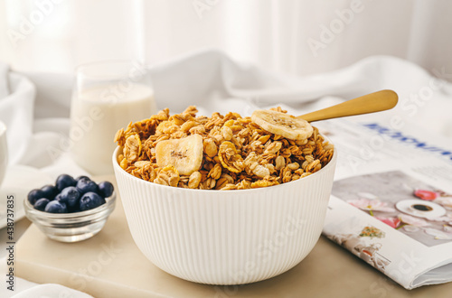 Bowl with tasty granola on ...