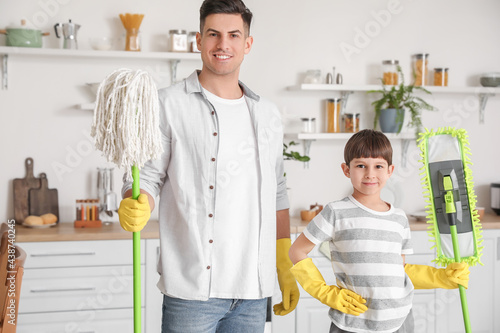 Father and son with floor m...