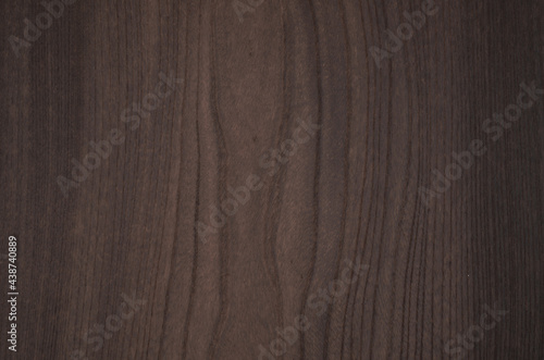 Brown wood texture background. Elegant wood grain facades.