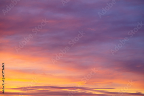 Colorful sunset with clouds in the sky. © schankz