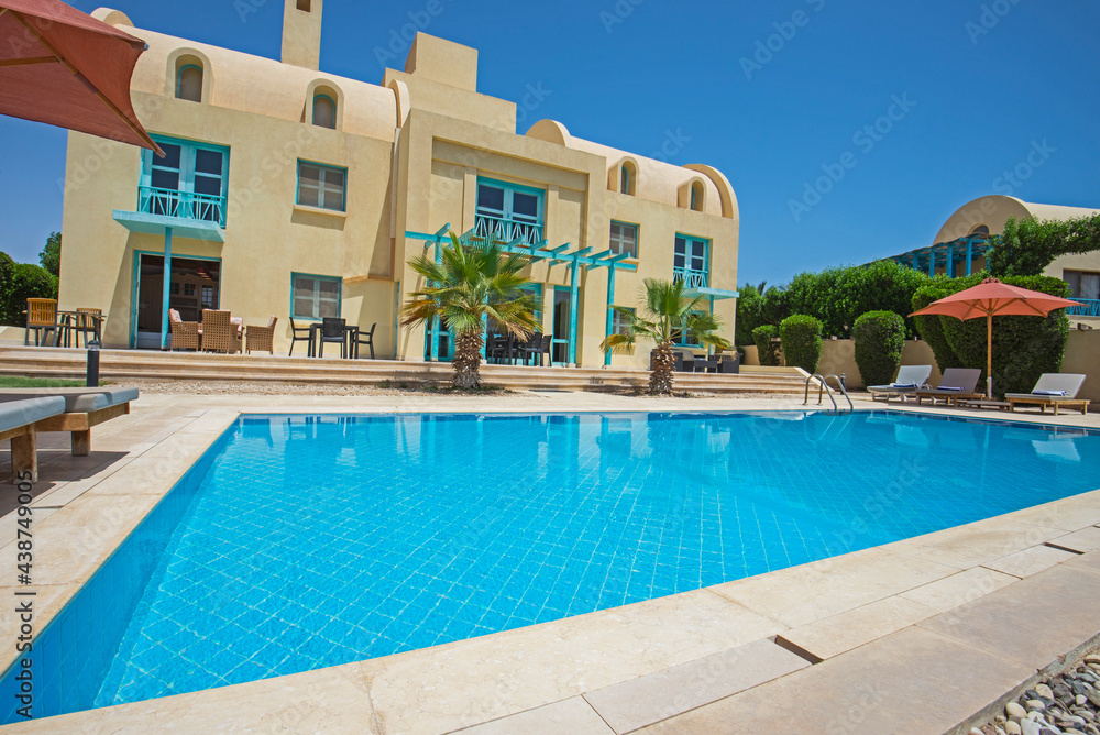 Swimming pool at at luxury tropical holiday villa resort