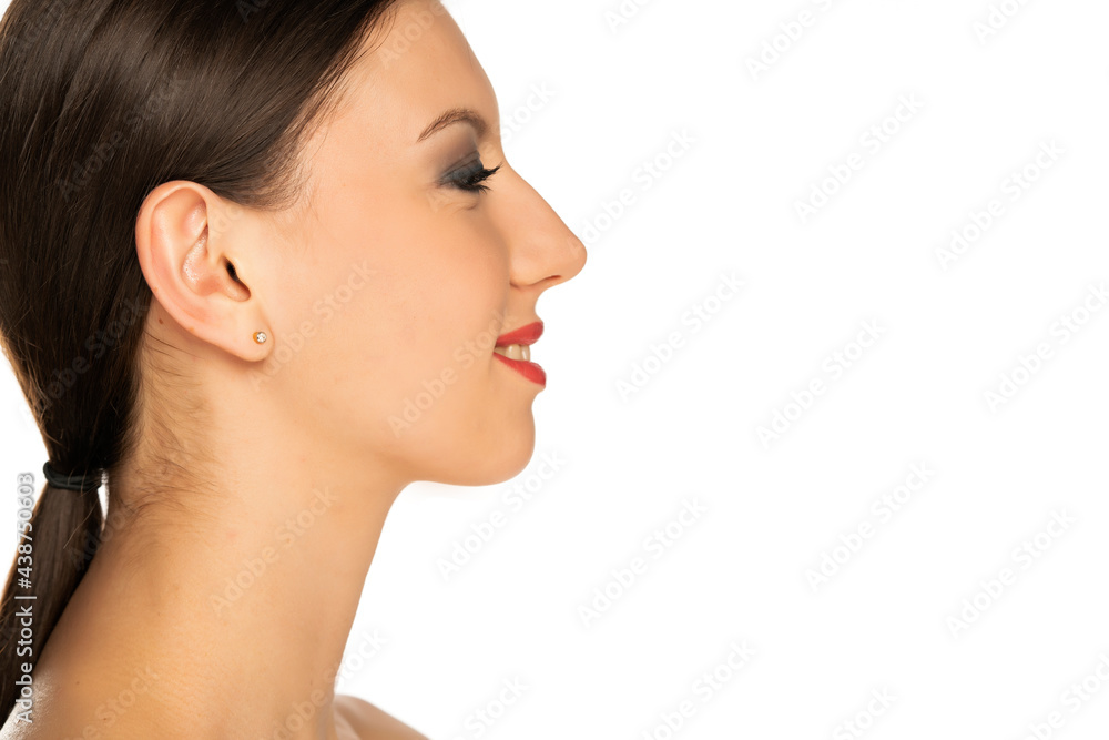 profile of a young beautiful smiling woman profile of a young beautiful smiling woman