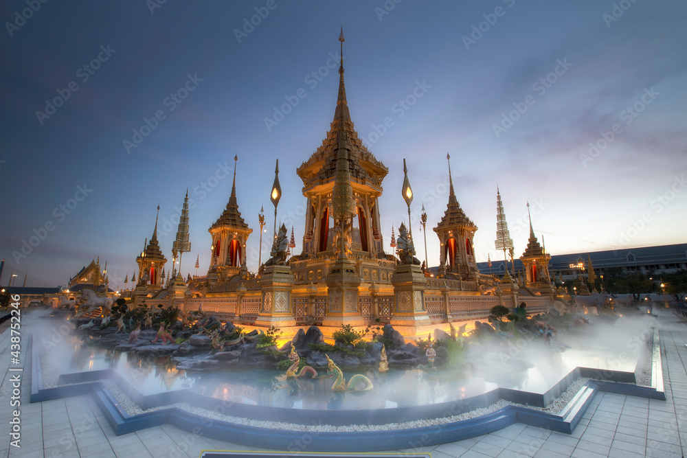 Obraz premium Royal crematorium. The royal pyre for royal funeral of H.M. King Bhumibol Adulyadej at Sanamlaung, Bangkok, Thailand. Long exposure, Moving crowd.