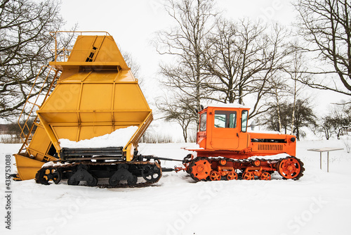 Caterpillar tractor DT-75B and mechanical peat collecting machine MTF-43. photo