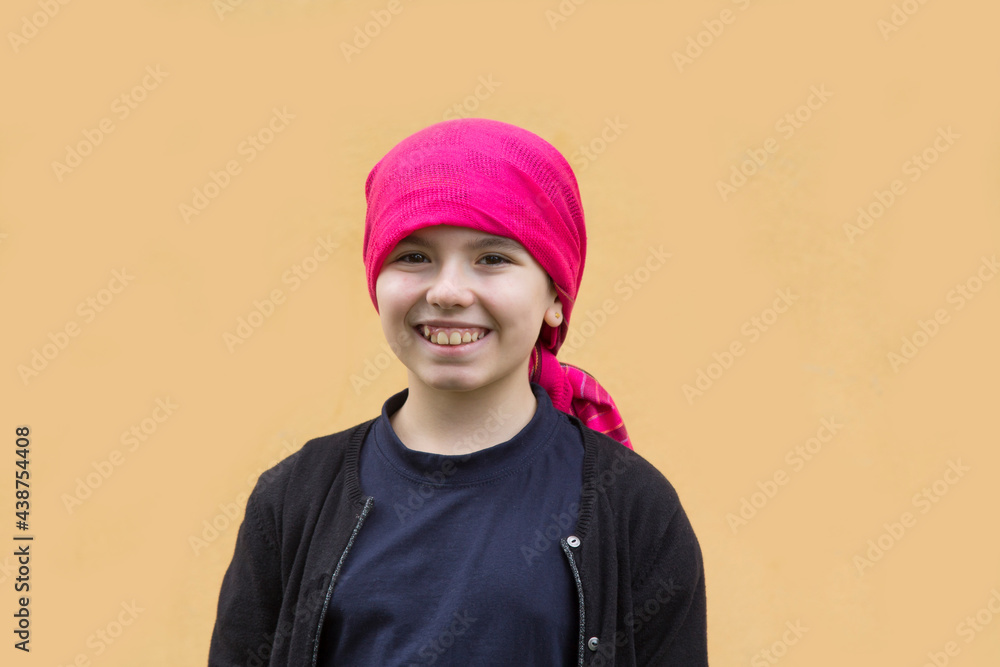 portrait of smiling girl with headscarf portrait of smiling girl with headscarf