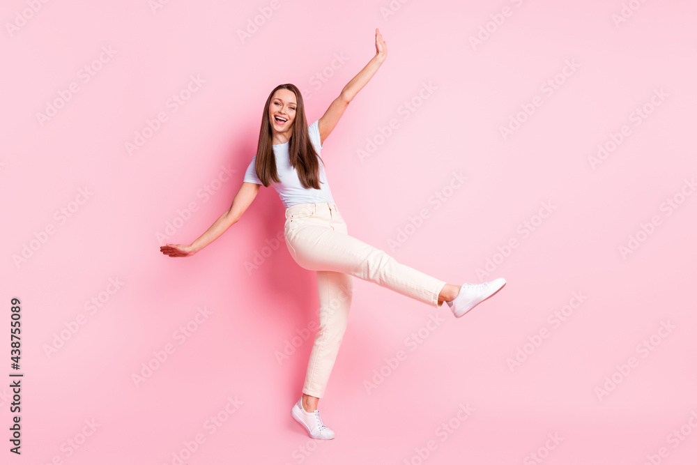 Full size photo of happy excited smiling positive funky funny woman dancing isolated on pink color background